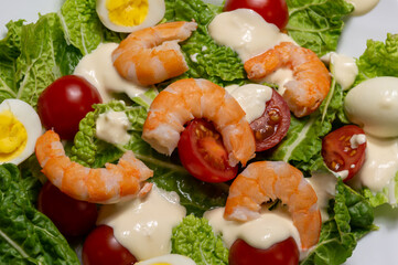 Ingredients shrimp, tomatoes, lettuce, eggs. Healthy meal or side dish