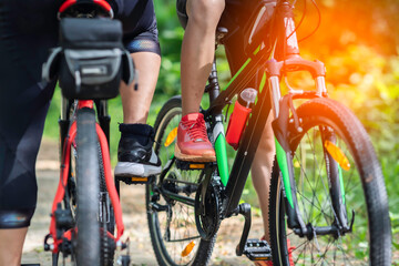 Fototapeta premium Asian are cycling road bike in the morning