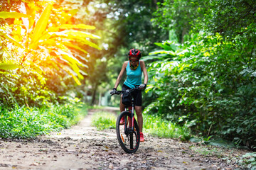 Naklejka premium Asian are cycling road bike in the morning