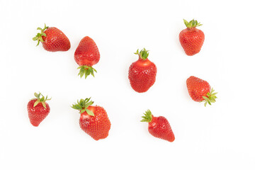 A few strawberries on a white background
