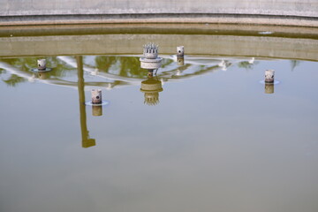 photos of a dirty broken water fontain