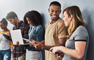 Tablet, laptop and row of happy business people in office for internet, website and online networking. Creative, startup and men and women on technology for job interview, hiring and recruitment