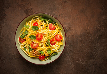 yellow zucchini salad, with cherry, vegetarian food, sliced into strips, homemade,