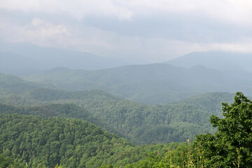 Naklejka premium Clouds over the Mountains