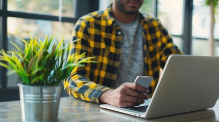 The man using laptop