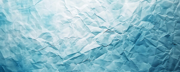 Obraz premium Light blue crumpled paper texture background displaying the intricate folds and creases of the material,