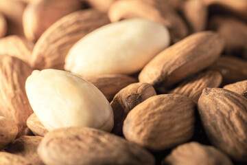 peeled almonds side view close-up , selective focus