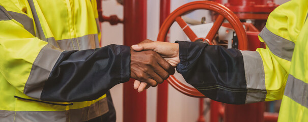 people shaking hands. man shaking hands during a meeting in the work site