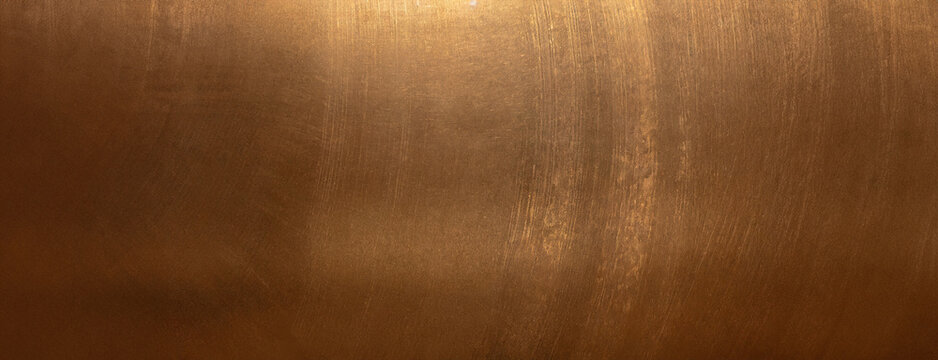 A polished bronze background with an abstract texture, presenting a warm metallic surface with a smooth finish.