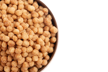 Mini Ball Shaped Cinnamon Toast Flavored Breakfast Cereal Isolated on a White Background