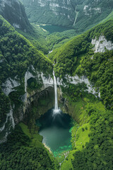 Fototapeta premium Majestic Heart Shaped Waterfall Aerial View of Stunning Green Forest and Crystal Clear Lake with Mirror-Like Reflection of Sky