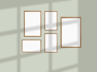 Minimal picture poster frame mockup on the wall with window shadow and leaves