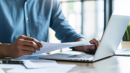 close up of a person typing on laptop