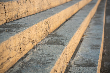 The stairs are made of concrete and are very steep