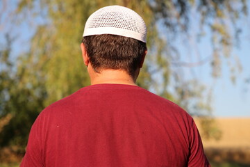 A man wearing a red shirt