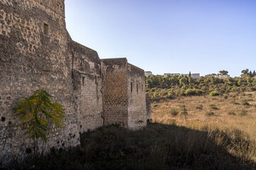 Fototapeta premium The massive stone wall of the Monastery of the Cross, an old fortress in Jerusalem, Israel. 