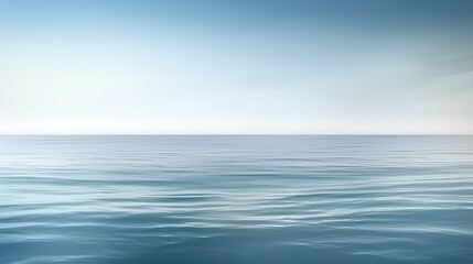 Obraz premium A seamless ocean view with a soft horizon under a clear blue sky.