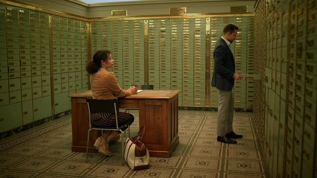 Exchange confidential documents at secure bank safe deposit box meetings for business purposes