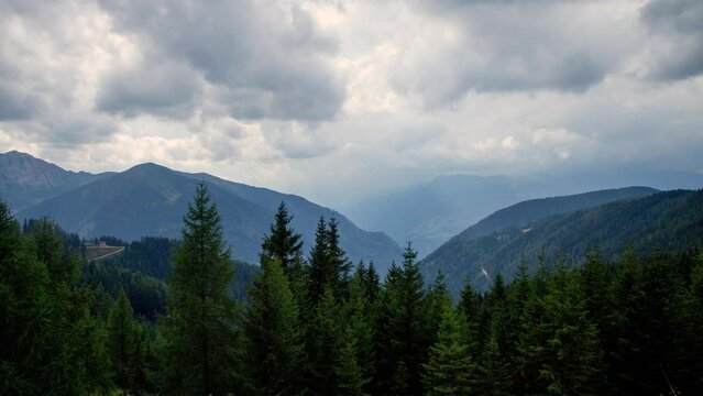 Timelapse of a valley before the storm in the Austrian Alps, moving right to left