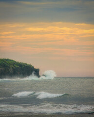 waves crashing on rocks