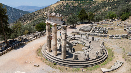 Aerial bird's eye view photo taken by drone of archaeological site of ancient Delphi, site of temple of Apollo and the Oracle, Voiotia, Greece