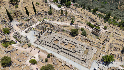 Aerial bird's eye view photo taken by drone of archaeological site of ancient Delphi, site of temple of Apollo and the Oracle, Voiotia, Greece