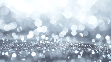 Sparkling Silver Glitter Background with Bokeh Lights for Festive Celebrations