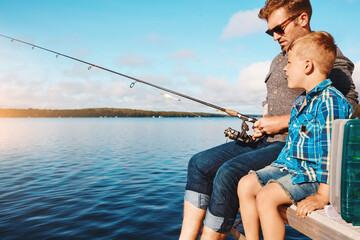 Lake, father and son together for fishing lesson with holiday bonding, knowledge and teaching skill. Dad, child and learning tips to catch fish by river with rod, travel and vacation peace in Florida