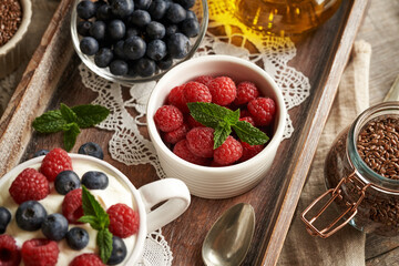 Fresh raspberries with flax seed oil, cottage cheese and blueberries