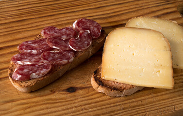 Two slices of toasted bread covered with slices of 