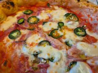 Spicy Neapolitan pizza. Neapolitan pizza with spicy peppers.