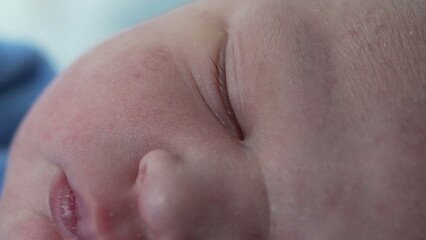 Fototapeta premium Peaceful sleep of a newborn in the hospital, highlighting the innocence and serenity of a new life in a calm and nurturing environment, macro close-up
