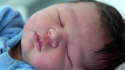 Serene close-up of a newborn sleeping peacefully, capturing the delicate features and pure innocence of new life in a moment of tranquility