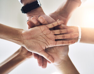 Below, medical and hands stacked in hospital for teamwork support, solidarity and collaboration of...