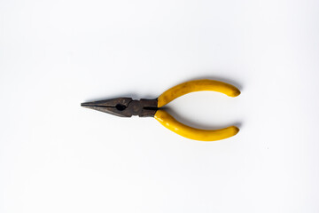 Needle nose pliers. Wire cutter or flush nippers. Universal long nose pliers for electric wire. Professional tools for metal construction. Mechanic instrument for workshop, repairing works.