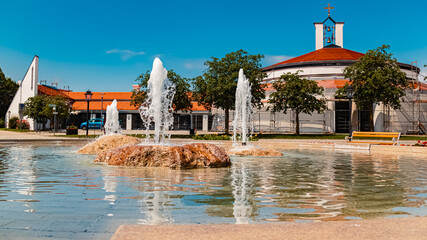 Summer view with reflections at a fountain, Therme Bad Griesbach im Rottal, Passau, Bavaria, Germany