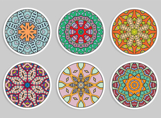 Decorative round ornaments set, isolated elements. Colorful mandala, stylized flower. Abstract geometric doodle patterns for plate decoration, fabric print,  business or greeting card design