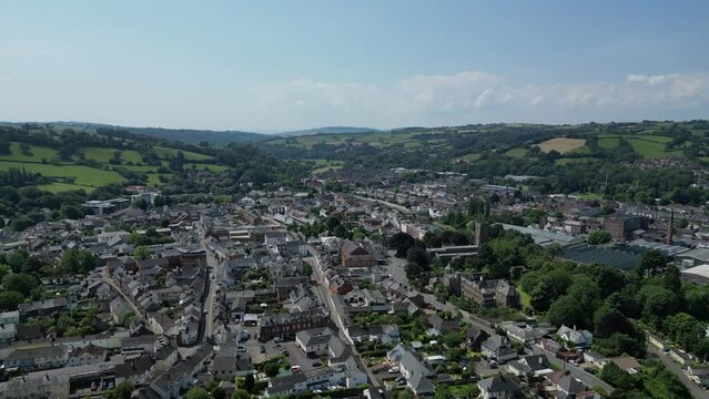 Tiverton, Devon, England: DRONE VIEWS: Townscape including the River Exe and St Peter's church. Tiverton dates from the Stone Age and was founded on the medieval wool trade (Clip 1).