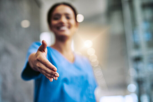 Nurse, woman and greeting handshake in hospital meeting, agreement and partnership opportunity for healthcare. Female employee, medical and welcome introduction, respect and onboarding clinic offer