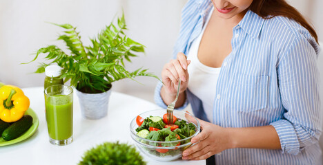 Healthy Dinner. Woman Eating Vegetable Salad At Home Kitchen, Crop