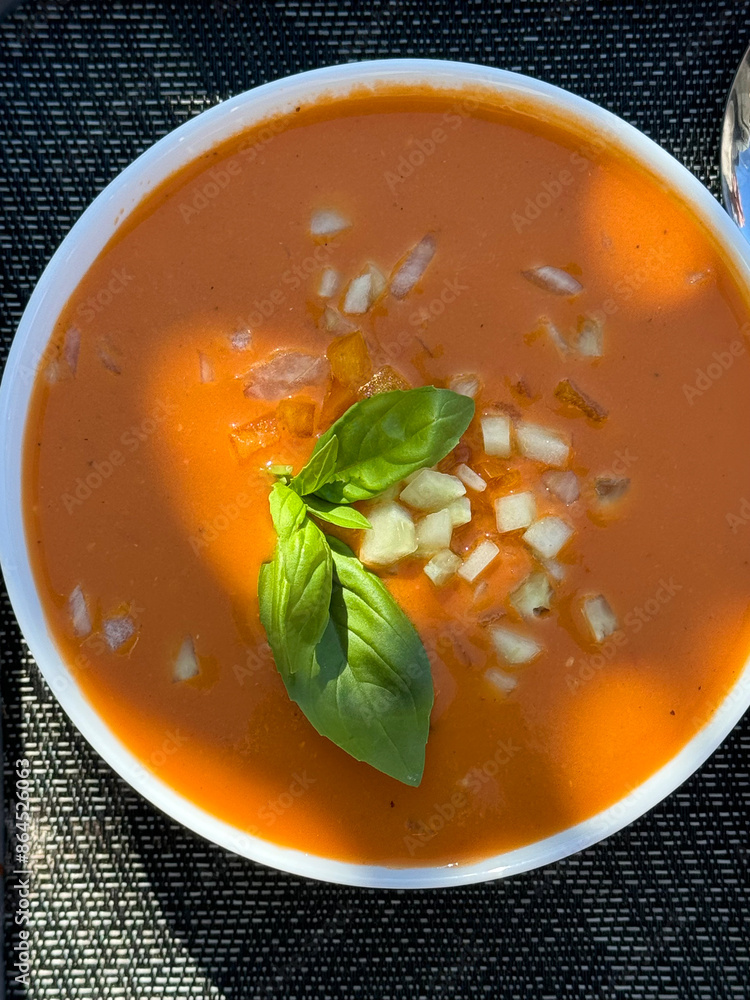 Sticker bowl of cold tomato soup