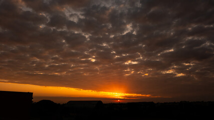 Sunrise, magnificent sunrise with its beautiful colors in winter Brazil, natural light, selective focus.