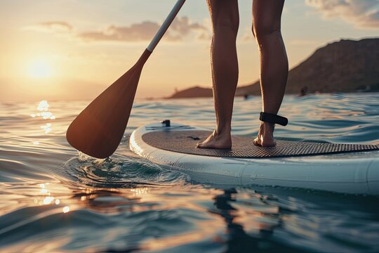 Paddleboarding at Sunset With Golden Light on the Water