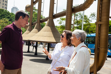 Senior tourists at the famous Jairo Varela Square. Senior travel concept.