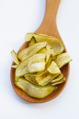 Banana chips, fried slices banana with green peel