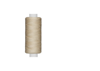 brown spool of sewing thread isolated on white background close up
