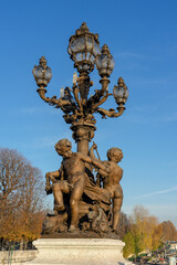 Fototapeta premium Decorative objects or artefacts from the Alexandre III bridge in Paris-France.