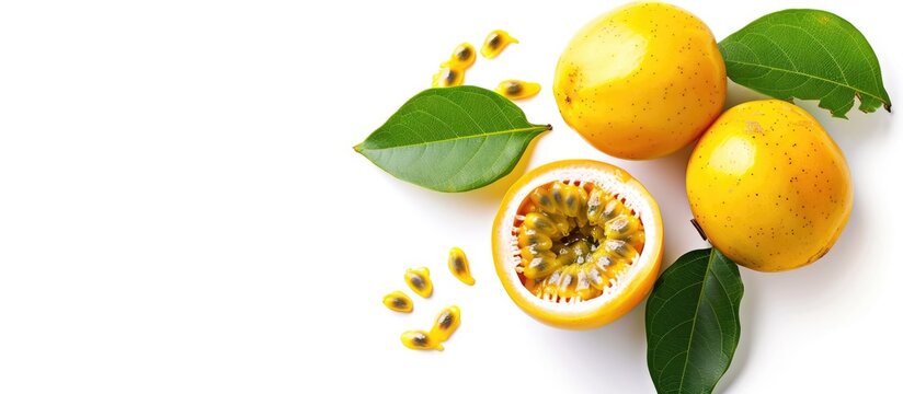 Isolated yellow passion fruit with leaf on white background with space for text, viewed from above.