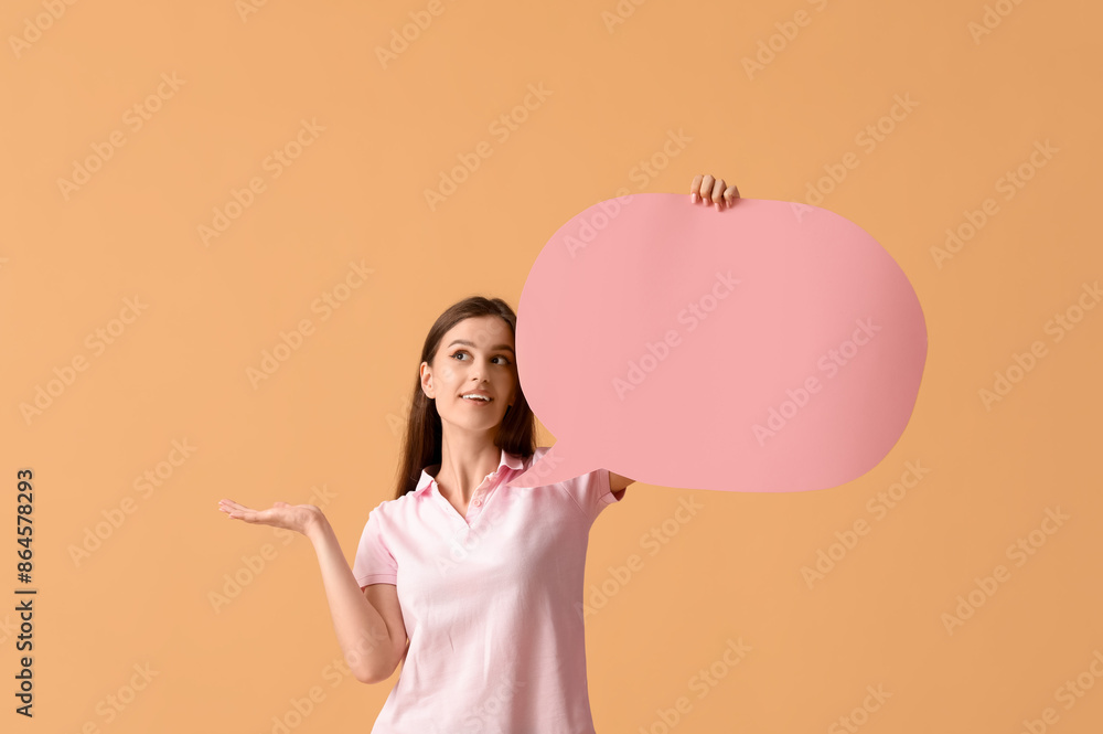 Sticker Beautiful thoughtful young woman with speech bubble pointing at something on orange background