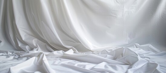 Textured white non-woven fabric providing a backdrop with copy space image.